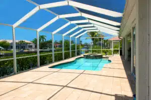 Wide,Angle,View,Of,Screened,In,Pool,And,Lanai,In